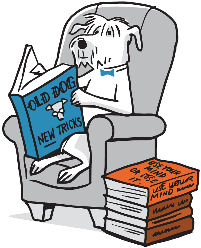 Dog reading a book about new tricks